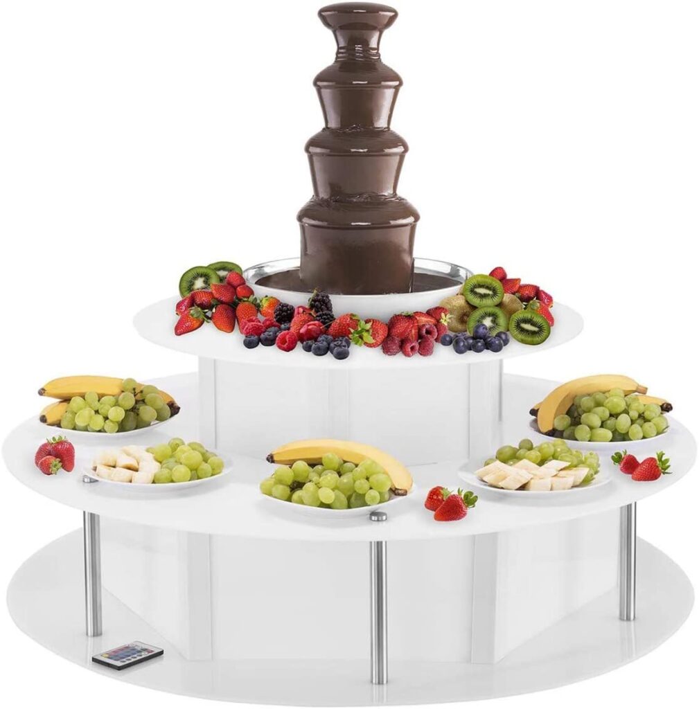 Mesa de frutas con fuente de chocolate